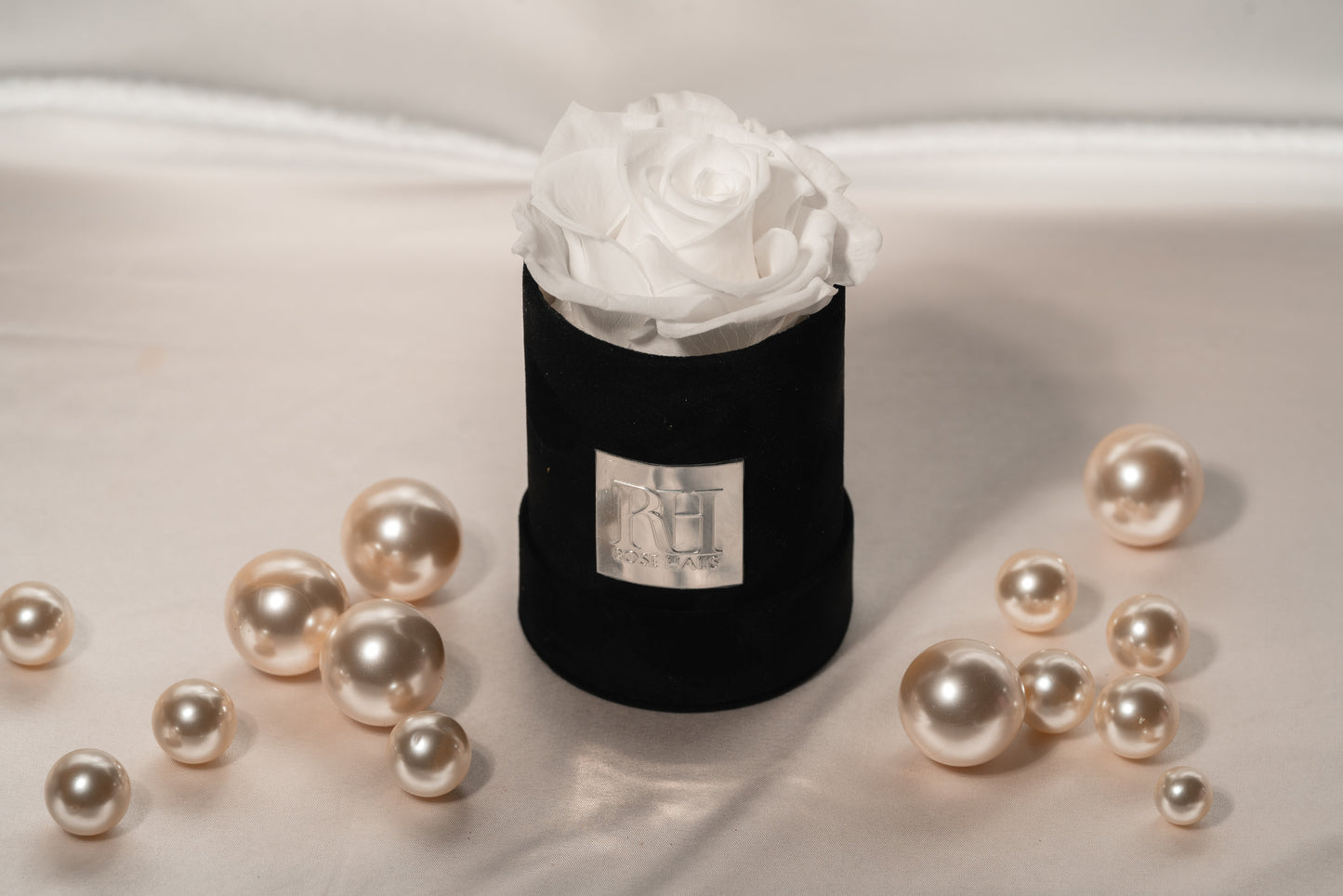 White Single XL Ecuadorian Preserved Rose in a 4" Black Velvet Round Mini Box